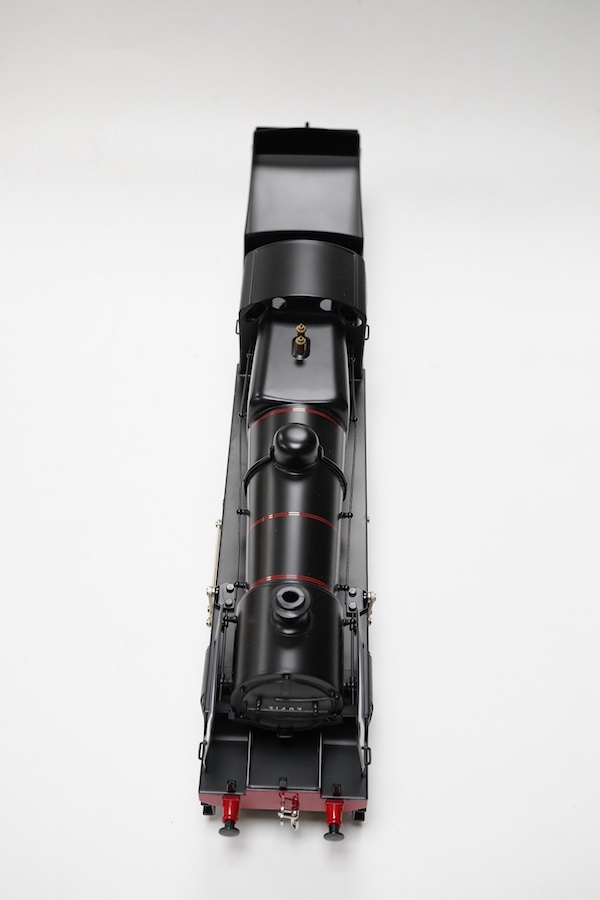 A boxed Bassett-Lowke by Corgi 0 gauge tinplate British Railways Maunsell N class 2-6-0 tender locomotive, 31407, in lined black livery, a special limited release, with option for two or three rail running, with instruct